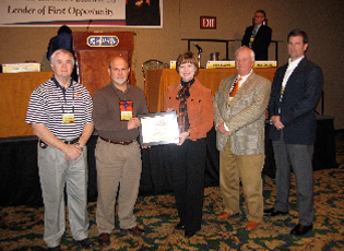 South Carolina Farm Loan Programs receives a certificate of appreciation for maintaining a low guaranteed loan delinquency rate and low guaranteed loan loss rate. (From left) Larry Rogers, Farm Loan Specialist; Steve Slice, Farm Loan Specialist; Teresa Lasseter, Administrator; Raleigh Ward, District Director; Jack Nettles, Farm Loan Manager.